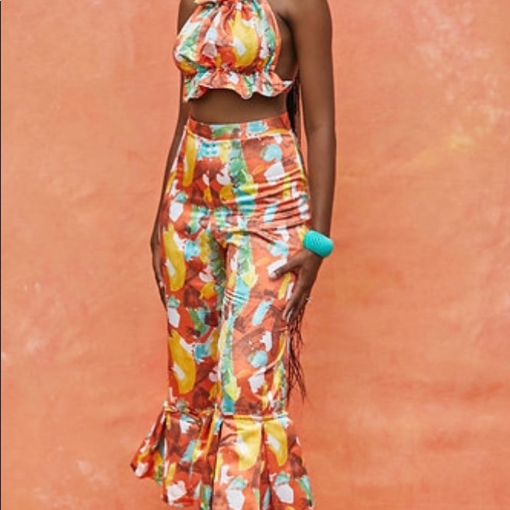 BRAND NEW NEVER WORN. Selling this 2 piece set from Rendoll Lagos. Size UK 18.